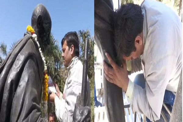 गांधी, ज्ञापन और आंसू! कॉलेज फर्जीवाडा उजागर करने वाले मानसेवी प्रोफेसर गांधी प्रतिमा के पैरों को पकड़ कर रोये, विधानसभा के बाहर 10 मार्च को करेंगे सत्याग्रह